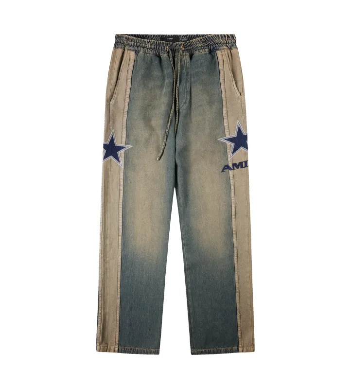Amiri Sport Denim Track Pant in Worn Slate sold by FOUR Amsterdam