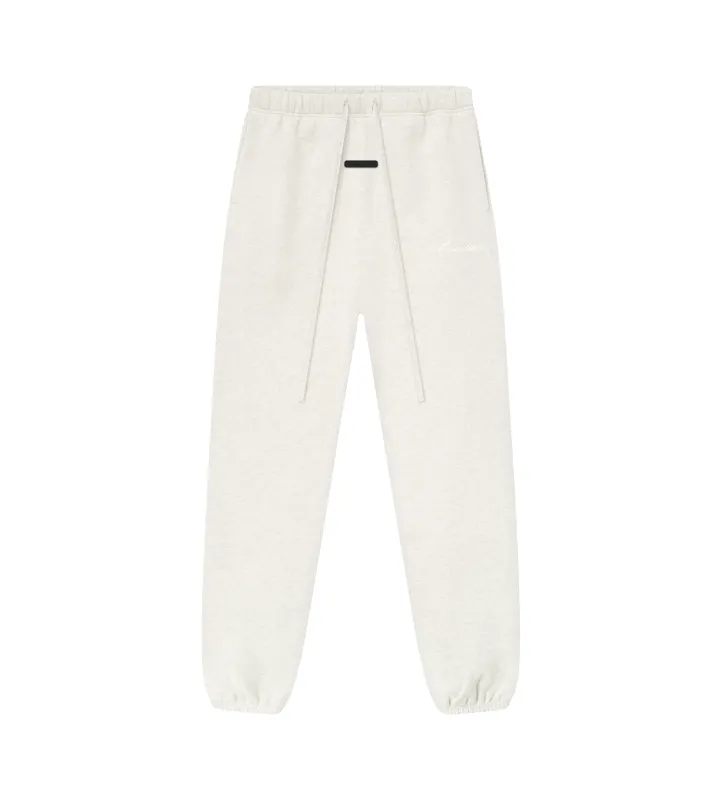 Fear of God Essentials Signature Classic Sweatpant in Oatmeal Heather sold by FOUR Amsterdam