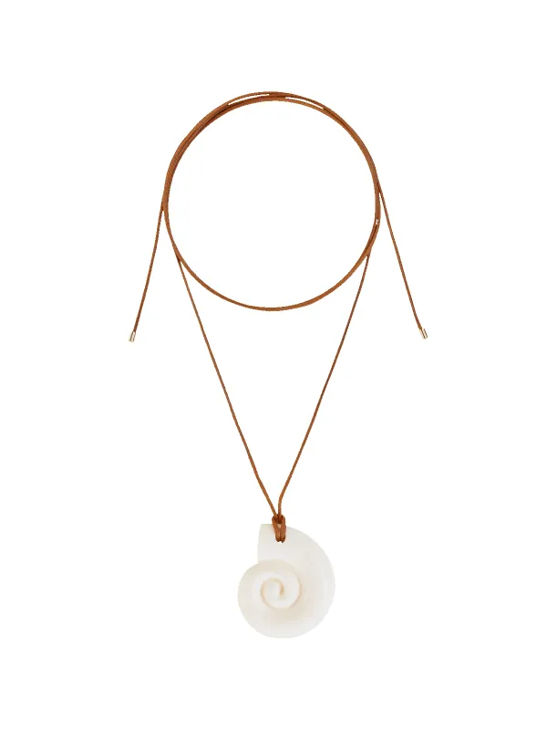 Moon Shell Medallion sold by Susmie’s