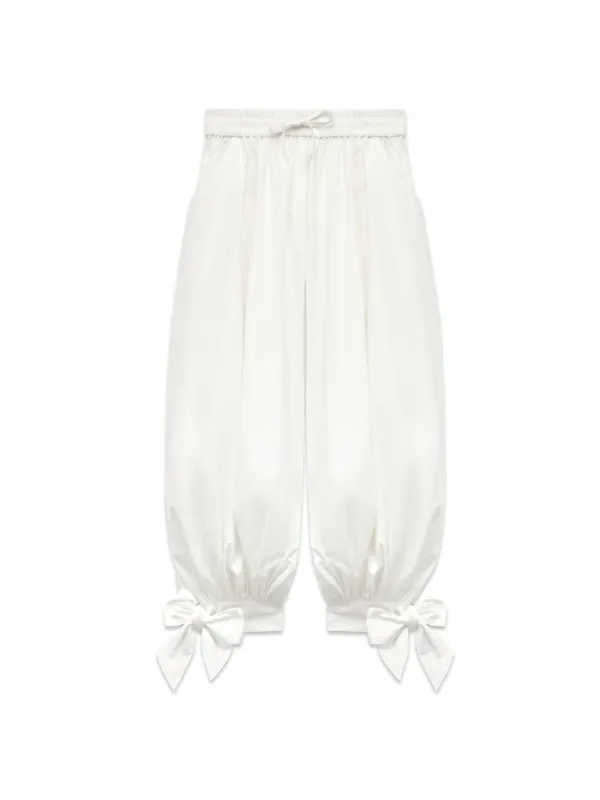 Magnolia White Pants sold by Susmie’s