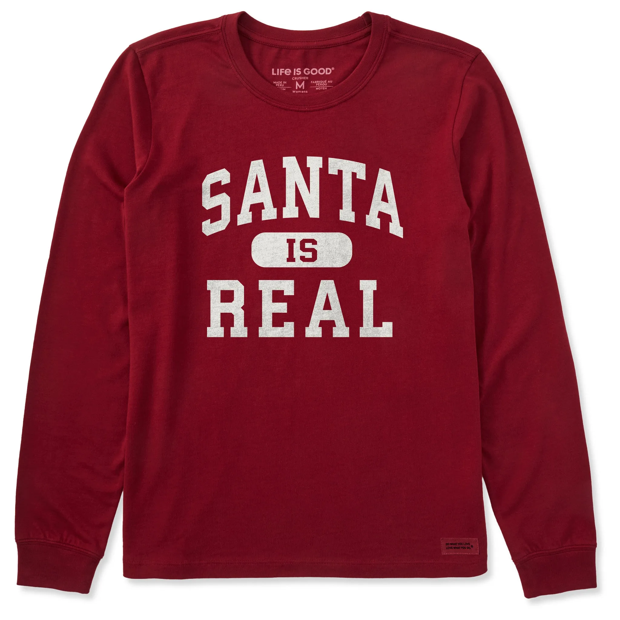 Women's Santa is Real Arch Long Sleeve Crusher Tee sold by Life is Good