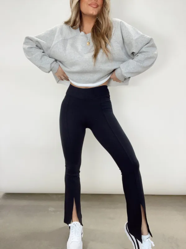 Black Front Slit Flare Leggings sold by LANE 201