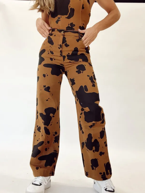 Step Into This Cow Print Pants sold by LANE 201