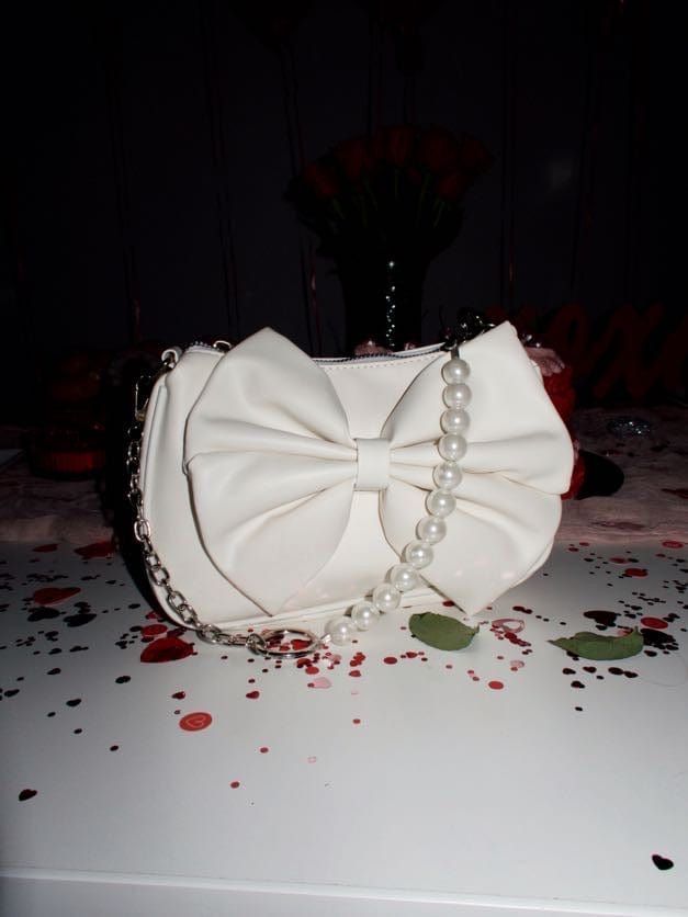 Bow Pearl Chain Bag sold by LANE 201