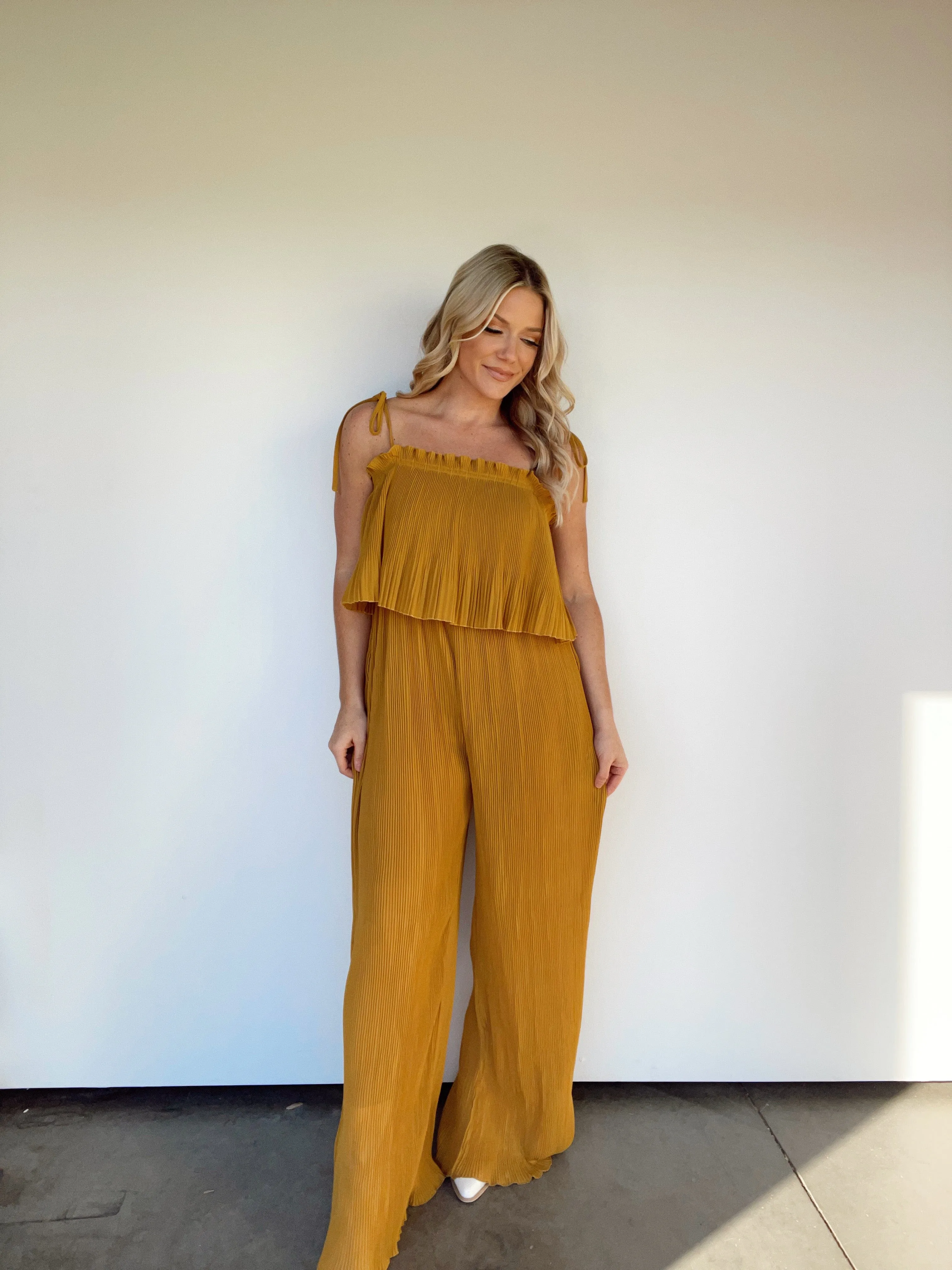 Mustard Pleated Jumpsuit sold by LANE 201