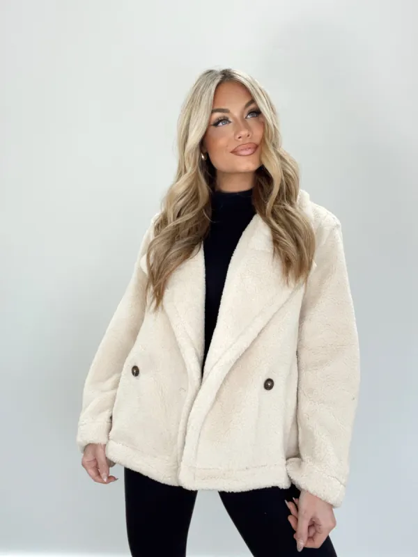Cream Teddy Coat sold by LANE 201