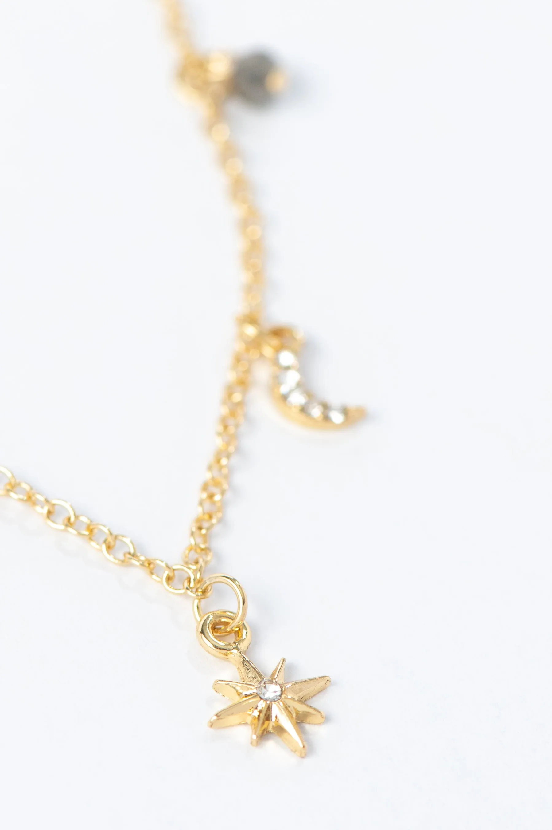 Gold Star And Moon Necklace sold by LANE 201 product image thumbnail 3
