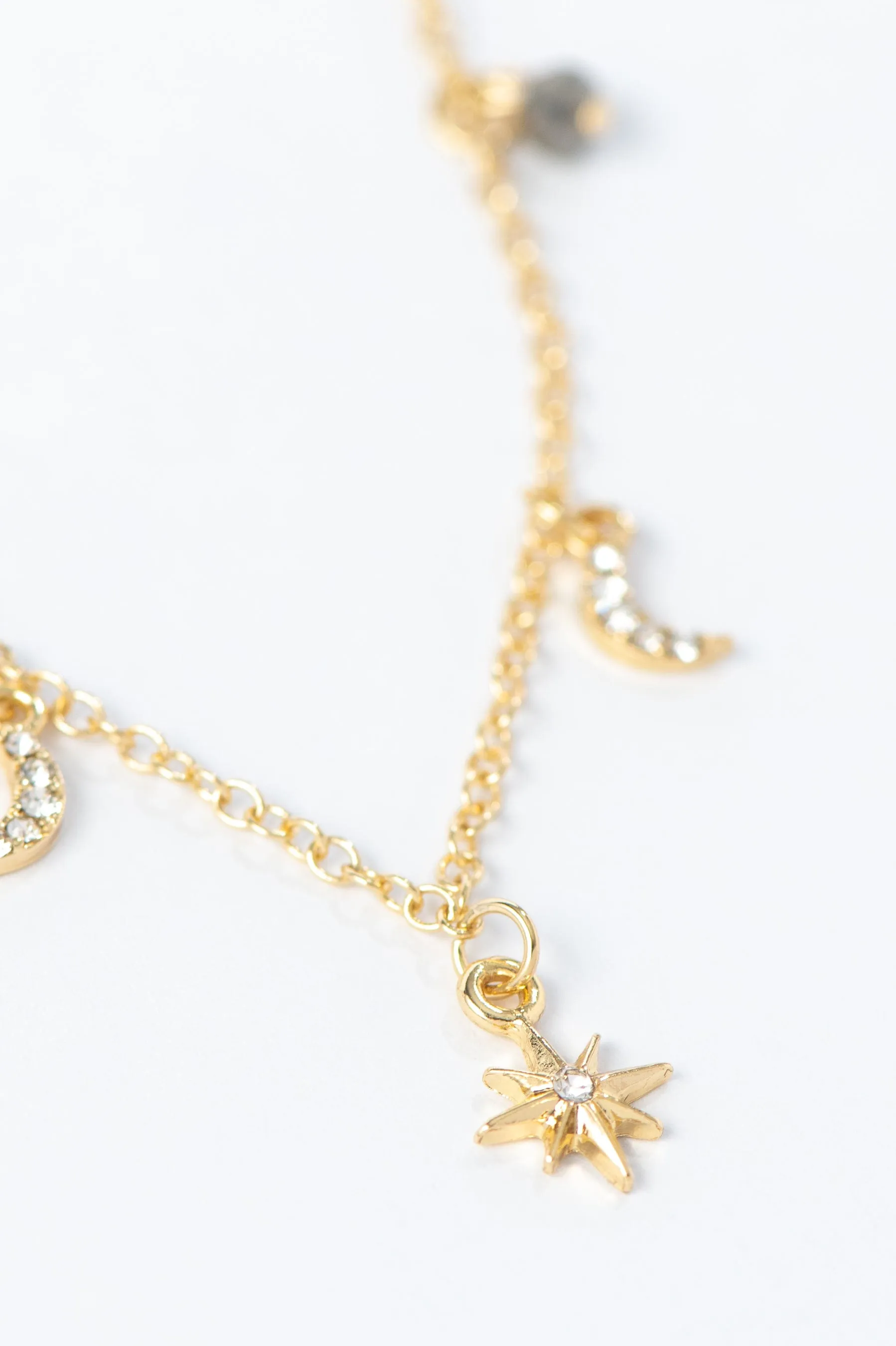 Gold Star And Moon Necklace sold by LANE 201 product image thumbnail 4