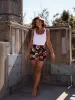 Floral Elegance Mini Skirt sold by LANE 201