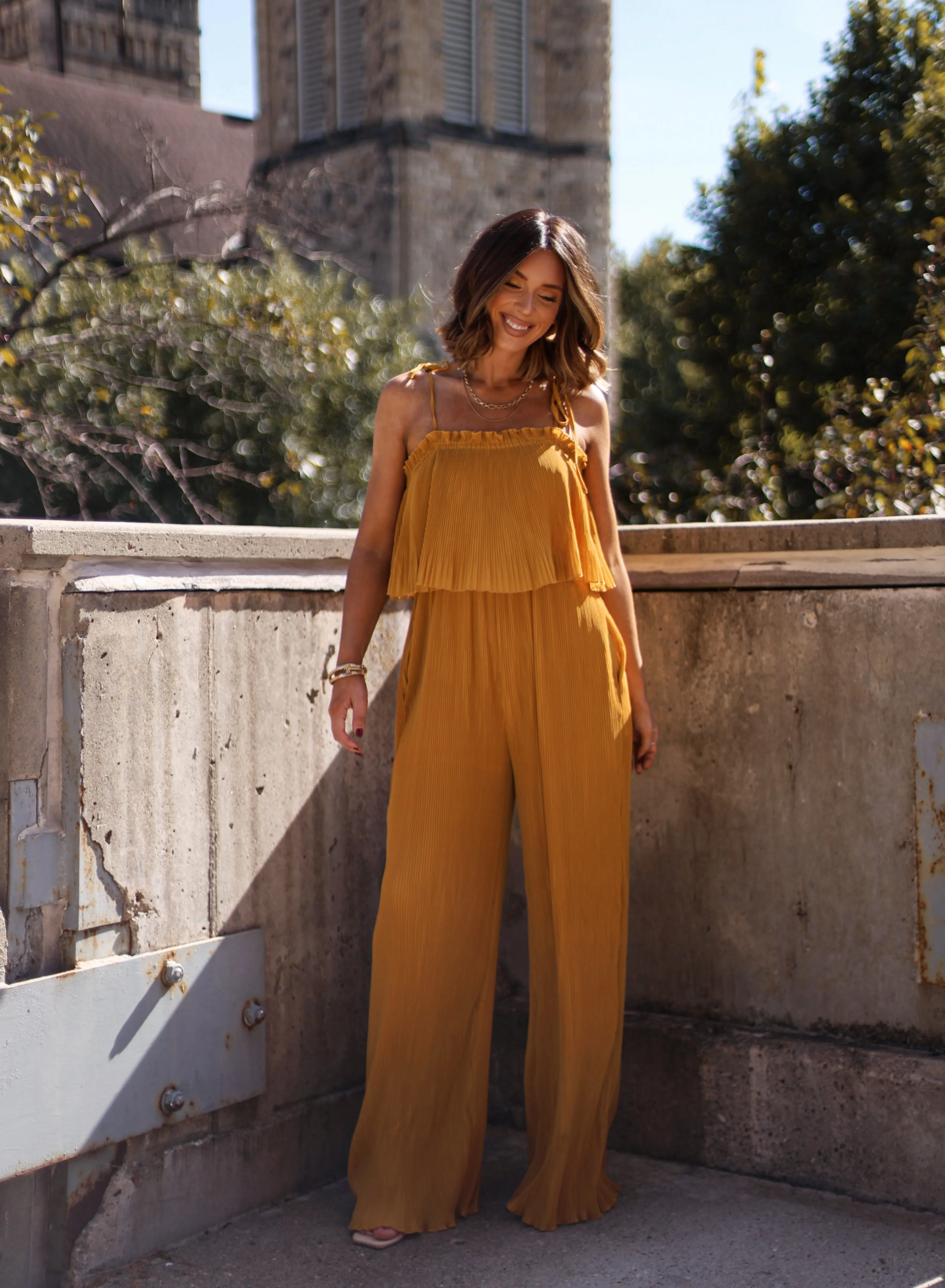 Mustard Pleated Jumpsuit sold by LANE 201