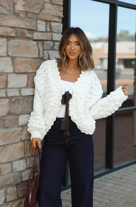 Winterlight Bow Cardigan sold by LANE 201