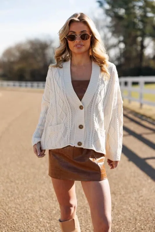 The Fireside Cable Cardigan sold by LANE 201