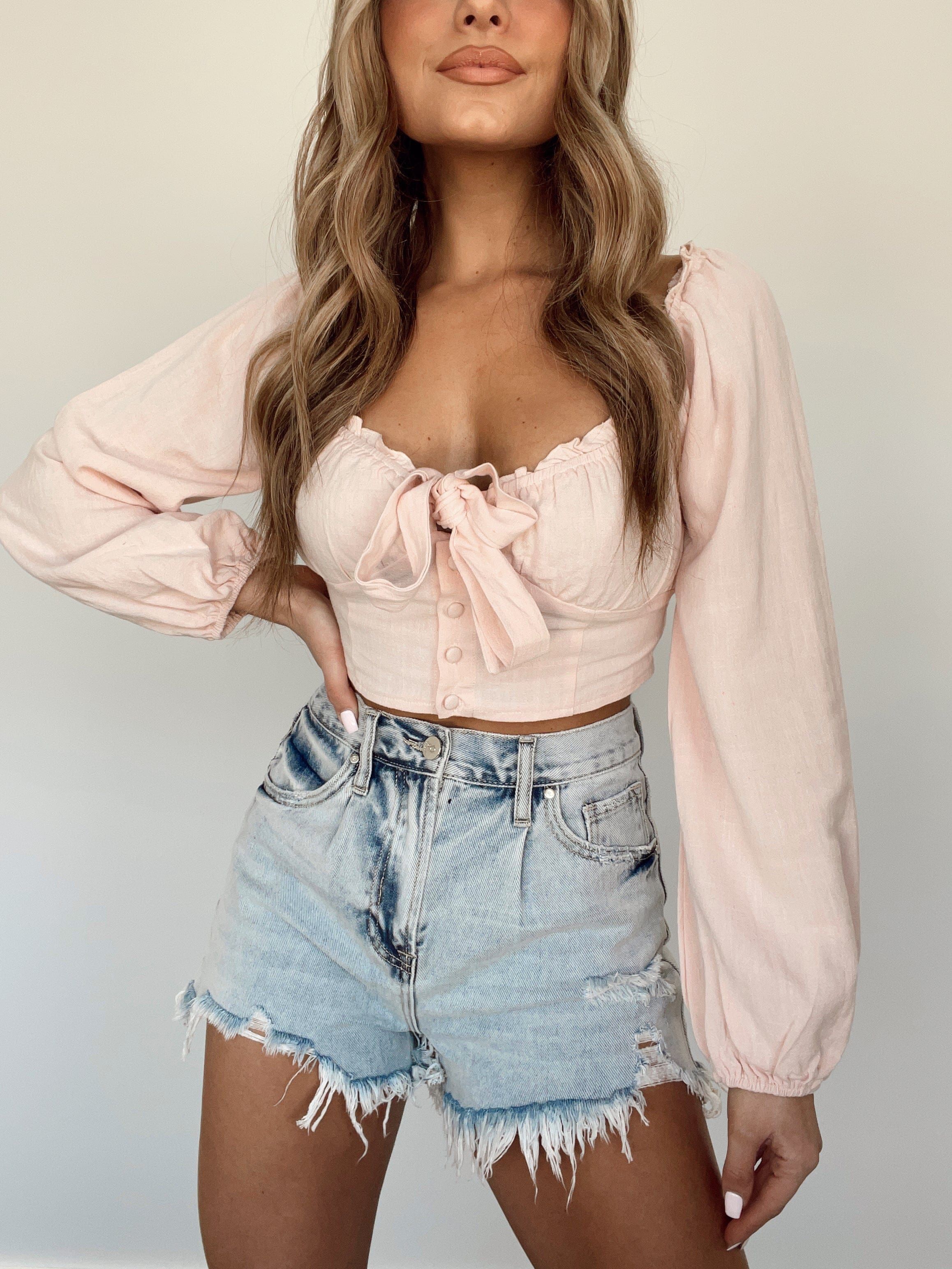 Light Wash Frayed Denim Shorts sold by LANE 201