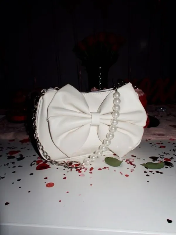Bow Pearl Chain Bag sold by LANE 201