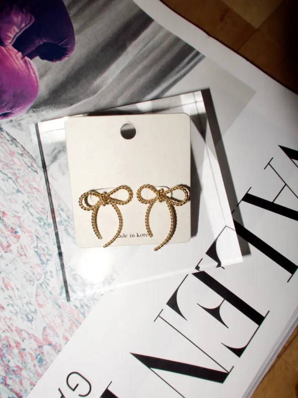 Bow Rope Earrings sold by LANE 201