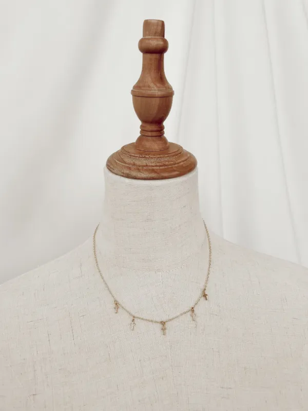 Don't Cross Me Gold Crystal Necklace sold by LANE 201