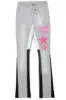 Raivo Heather Grey Graphic Stacked Flare Pant sold by Rockstar Original