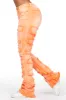 Zariyah Orange Stacked Flare Jean sold by Rockstar Original