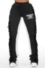 Kendra Black Fringe Stacked Flare Track Pant sold by Rockstar Original