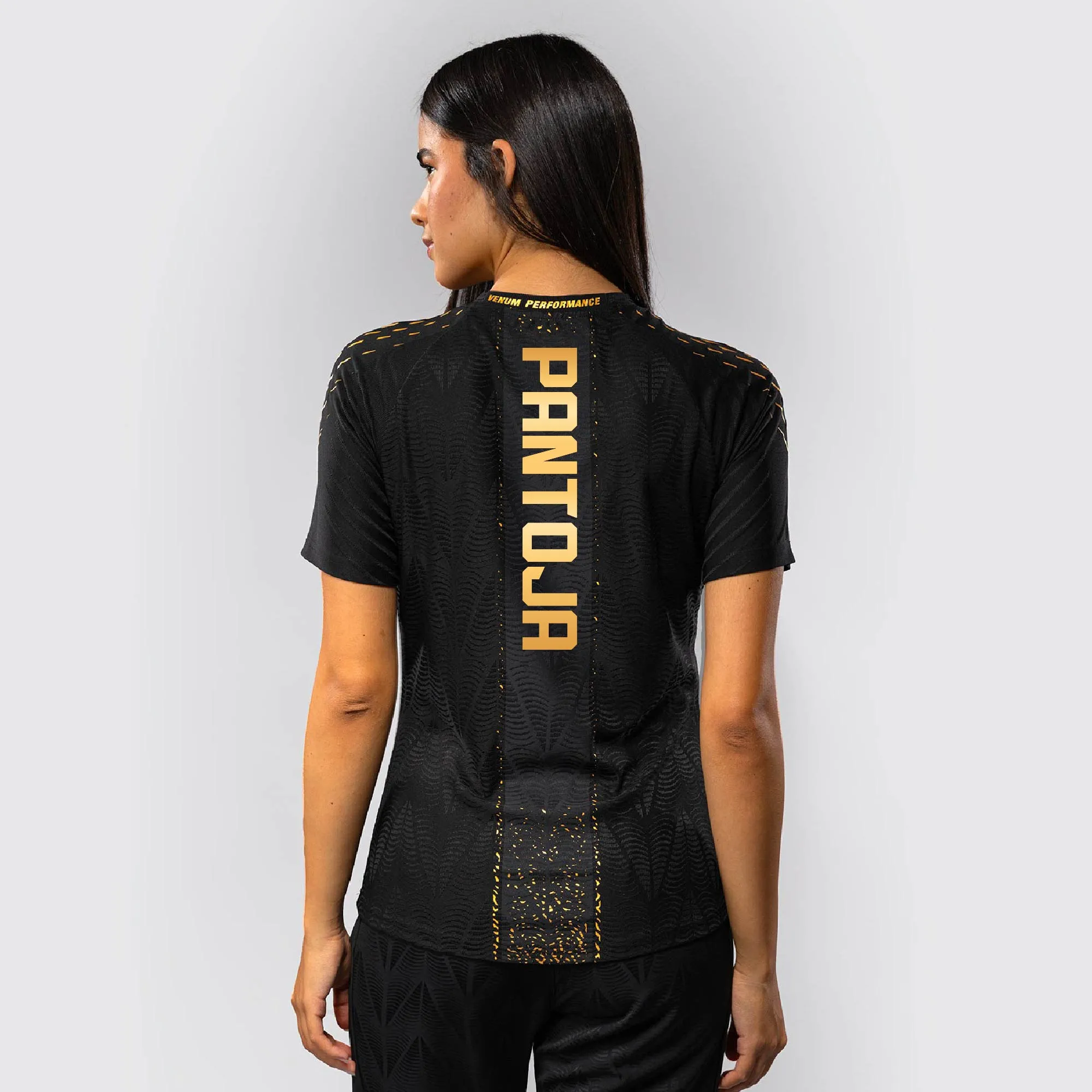 Women's UFC Zenith by Venum Black/Gold Alexandre Pantoja Authentic Fight Night Champion Walkout Jersey sold by UFC