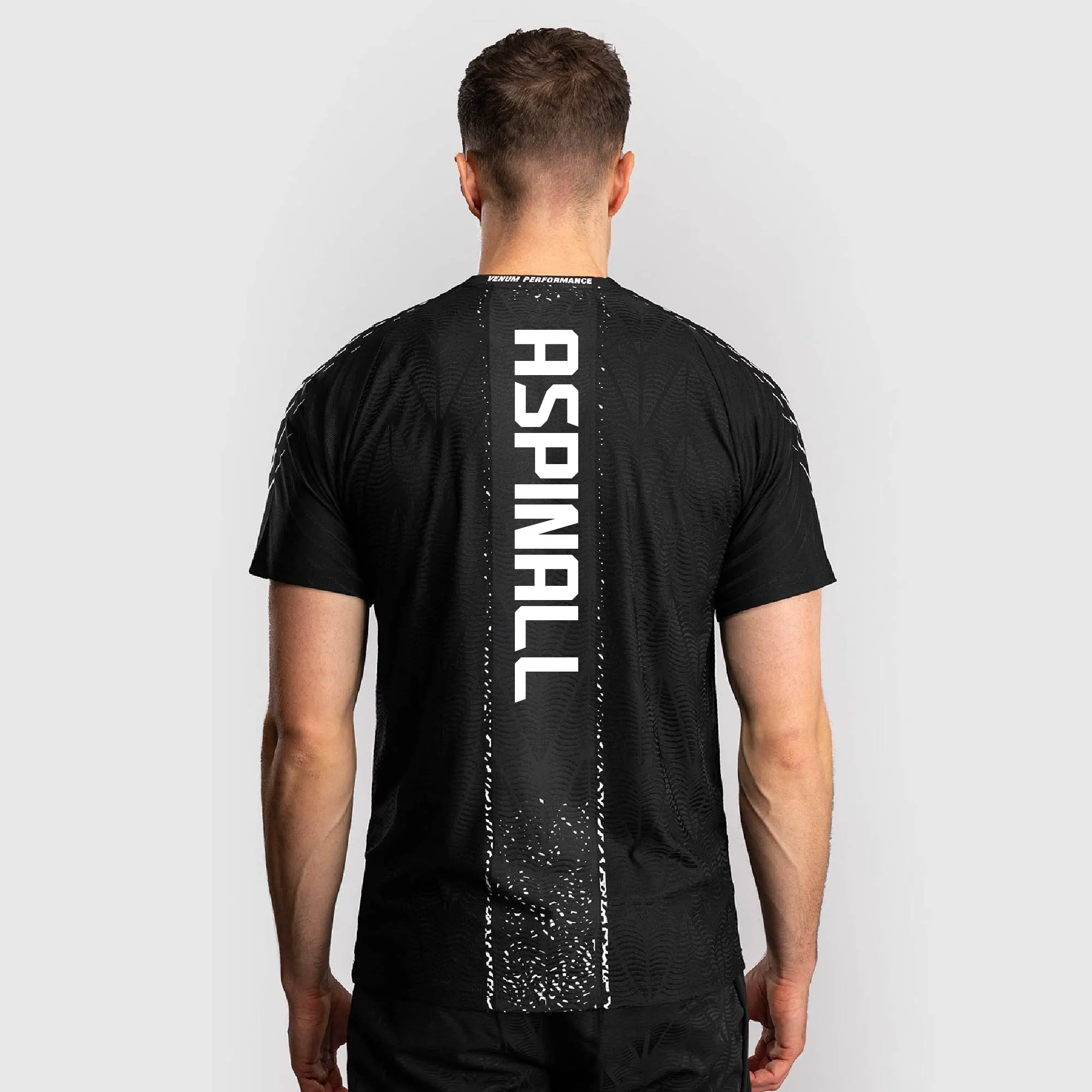 Men's UFC Zenith by Venum Black Tom Aspinall Authentic Fight Night Walkout Jersey sold by UFC