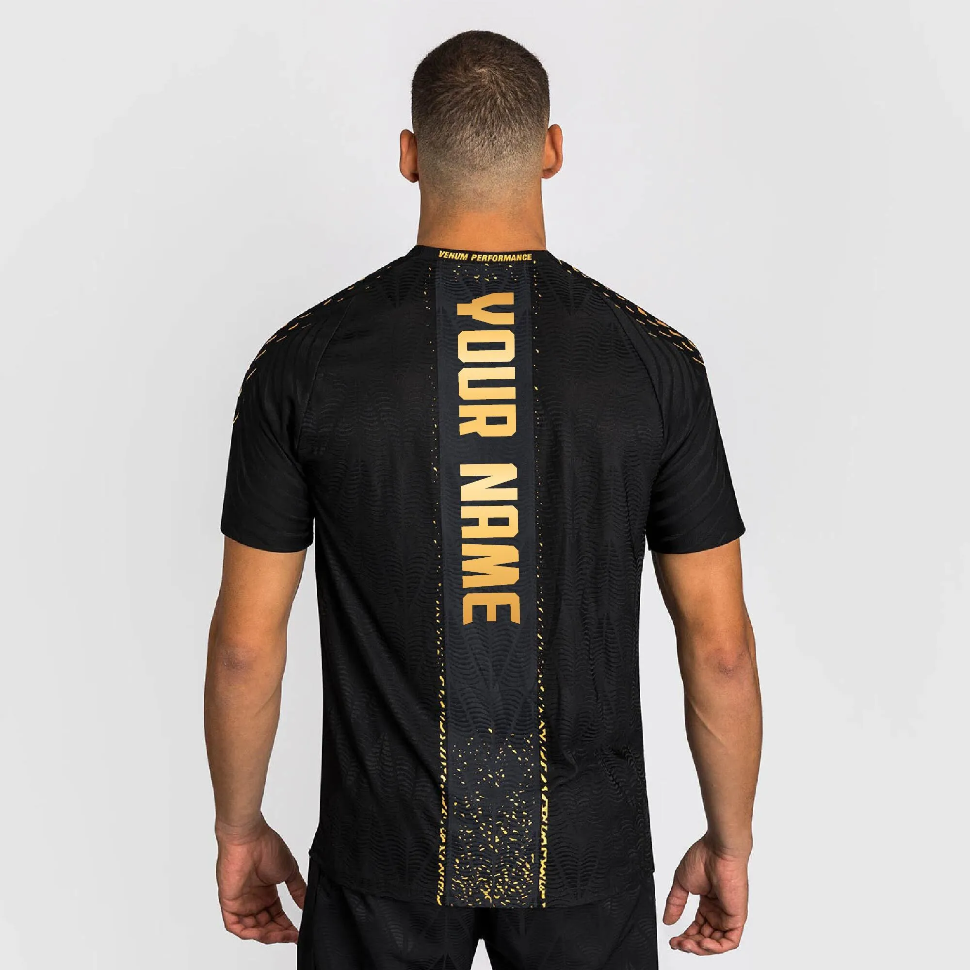 Men's UFC Zenith by Venum Black/Gold Authentic Fight Night Personalized Champion Walkout Jersey sold by UFC