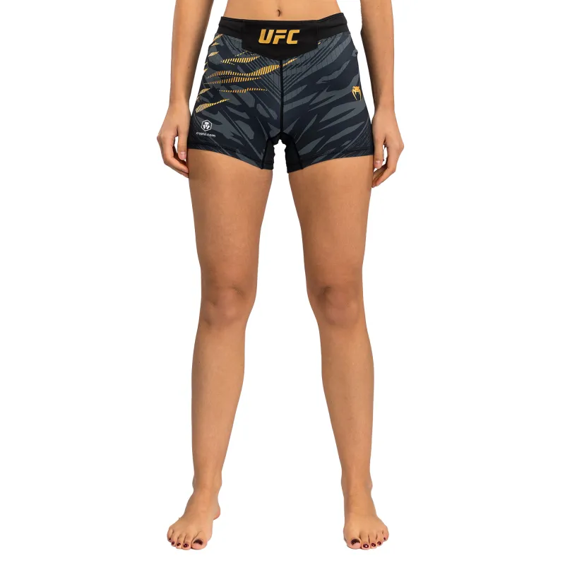 Women's UFC Fusion by Venum Black/Gold Fight Night Champion Short Fit Vale Tudo Shorts sold by UFC