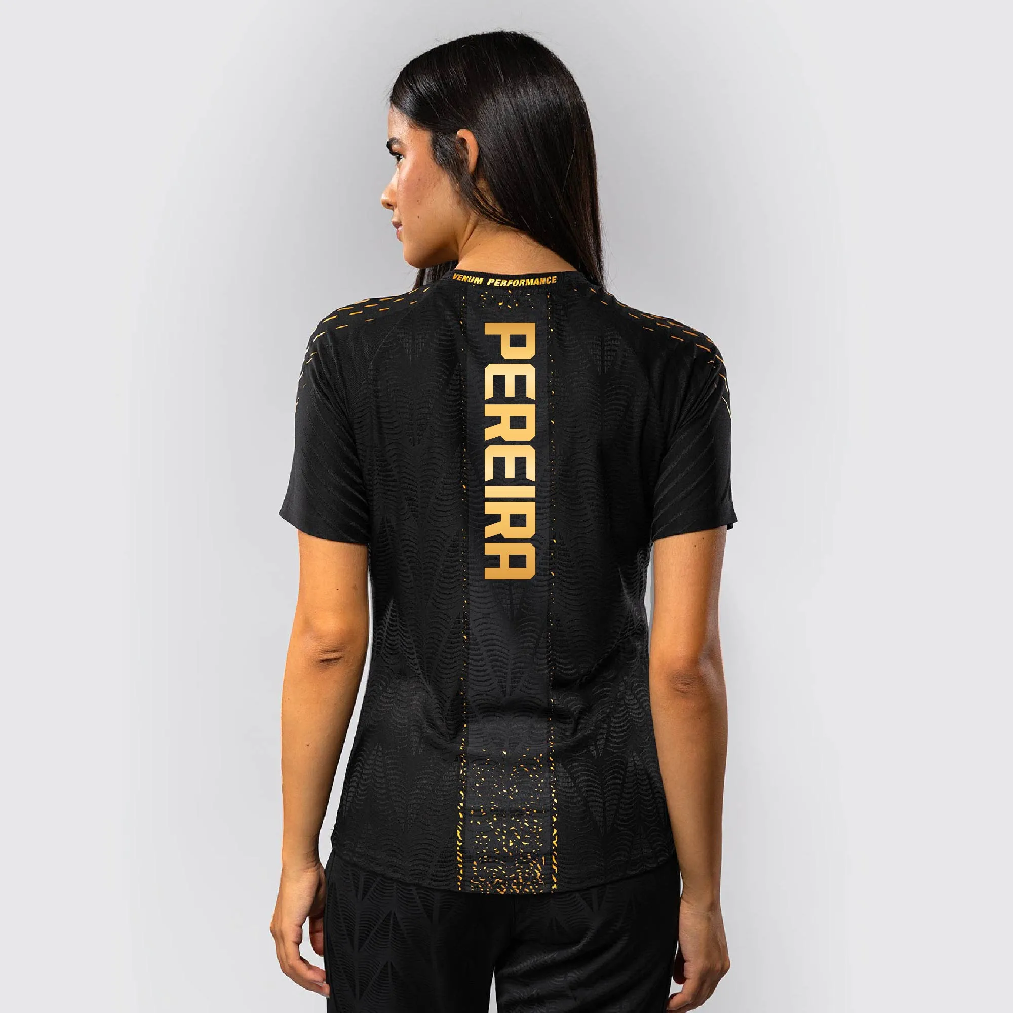 Women's UFC Zenith by Venum Black/Gold Alex Pereira Authentic Fight Night Champion Walkout Jersey sold by UFC