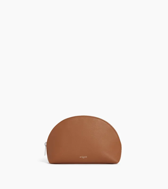 Half-moon toiletry bag in grained leather made by Le Tanneur