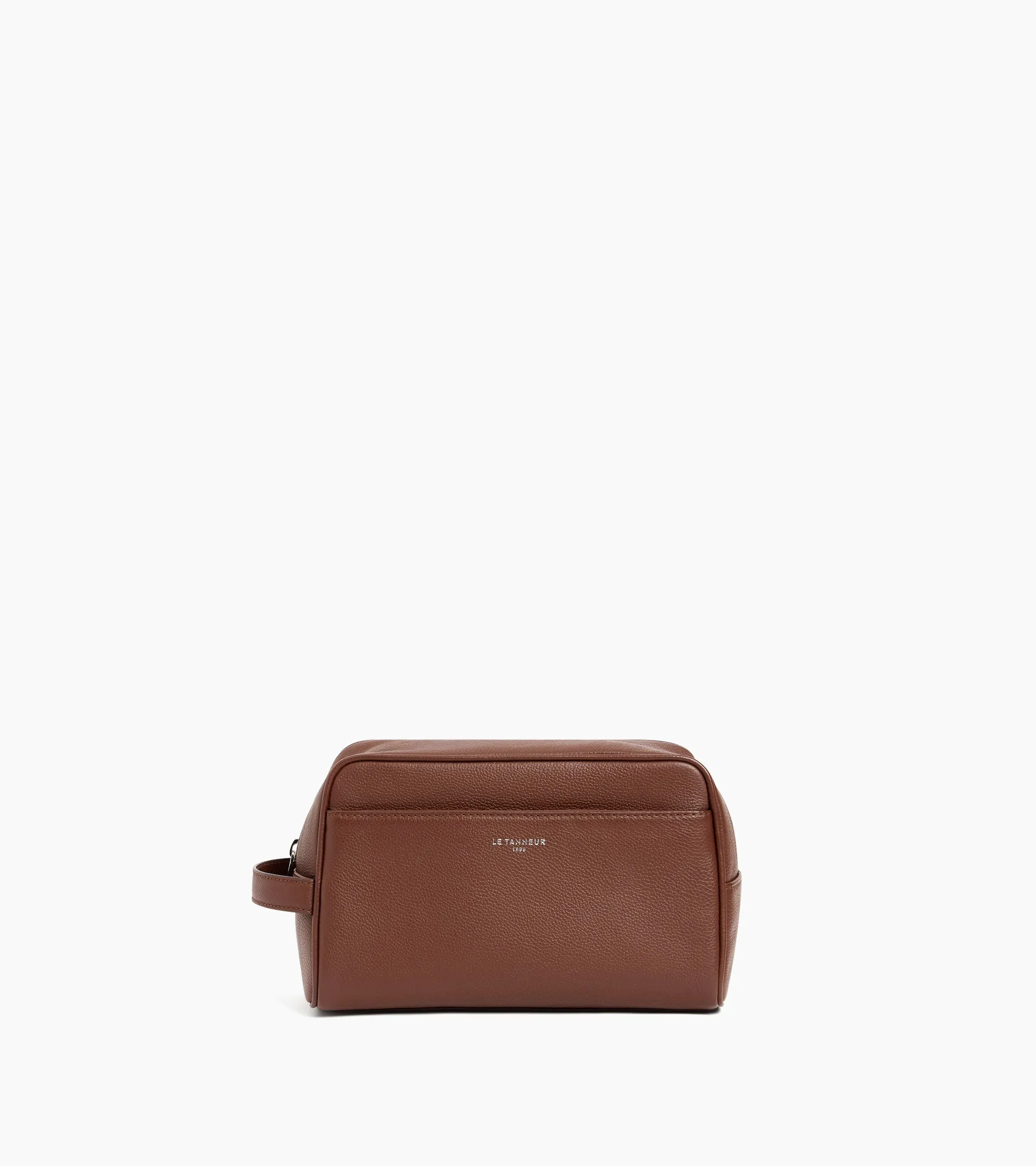 Toiletry bag in grained leather sold by Le Tanneur