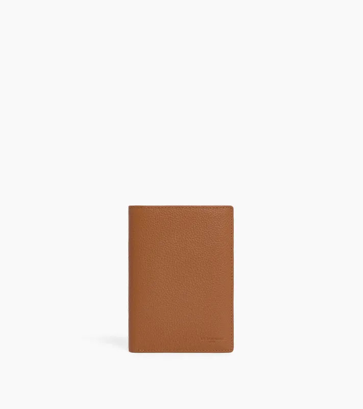 large, vertical, zipped wallet with 2 gussets in grained leather made by Le Tanneur