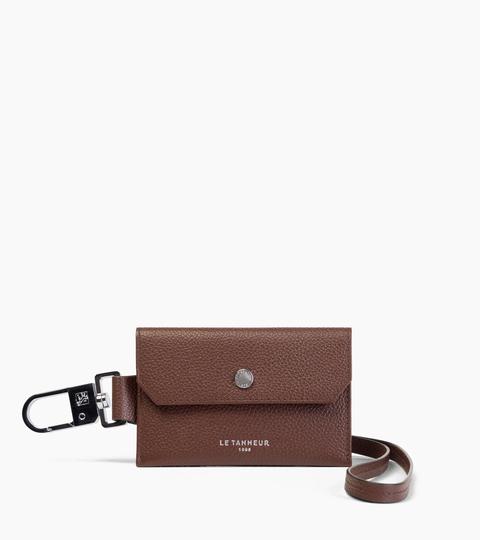 Luggage tag in grained leather sold by Le Tanneur