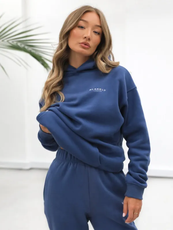 Universal Women's Relaxed Hoodie - Blue sold by Blakely