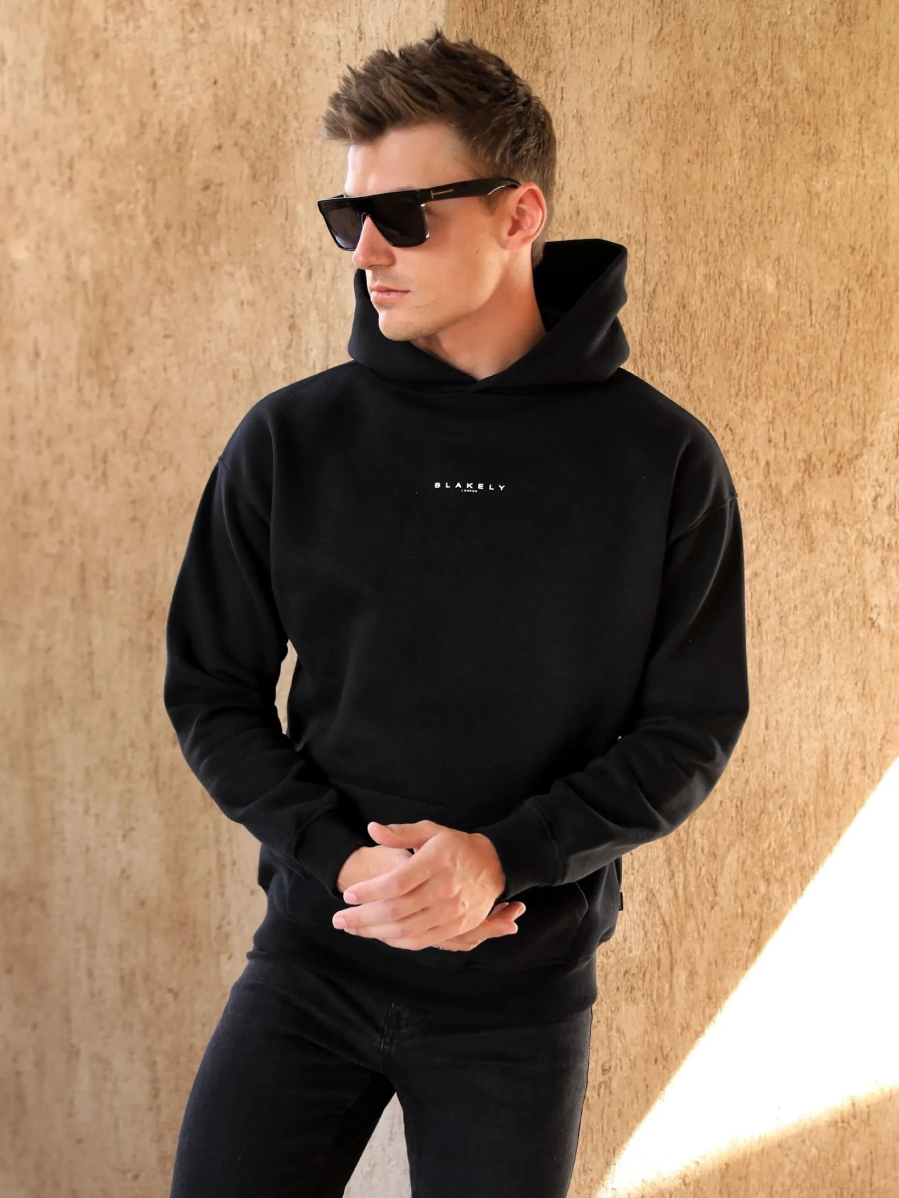 Evolved Lite Relaxed Hoodie - Black sold by Blakely
