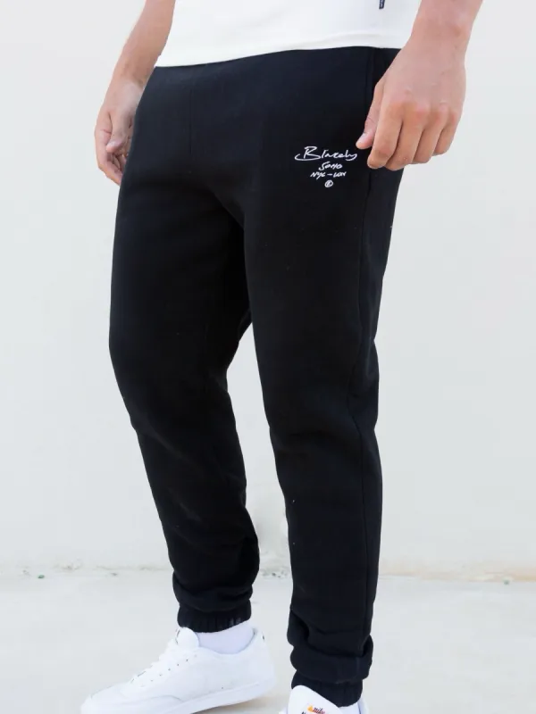 Soho Relaxed Script Sweatpants - Black sold by Blakely
