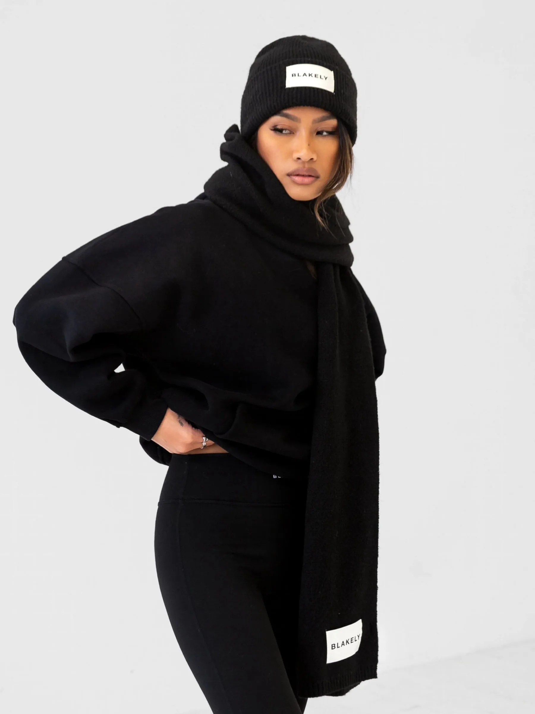 Label Knitted Scarf - Black sold by Blakely