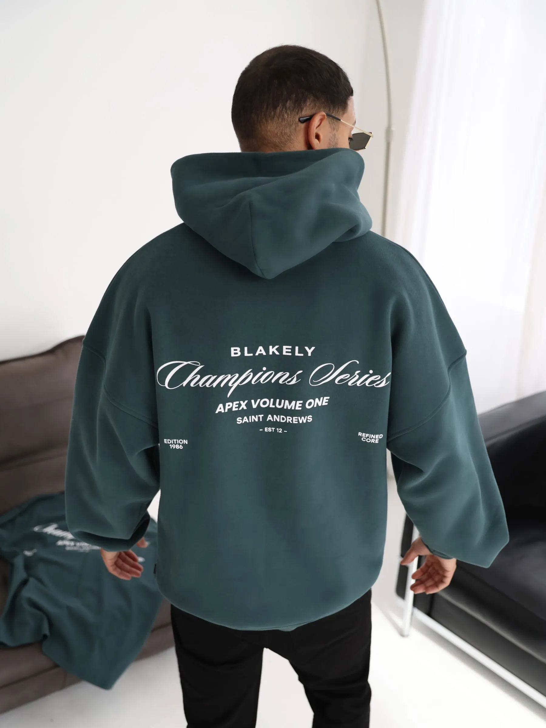 Champions Relaxed Hoodie - Teal Green sold by Blakely