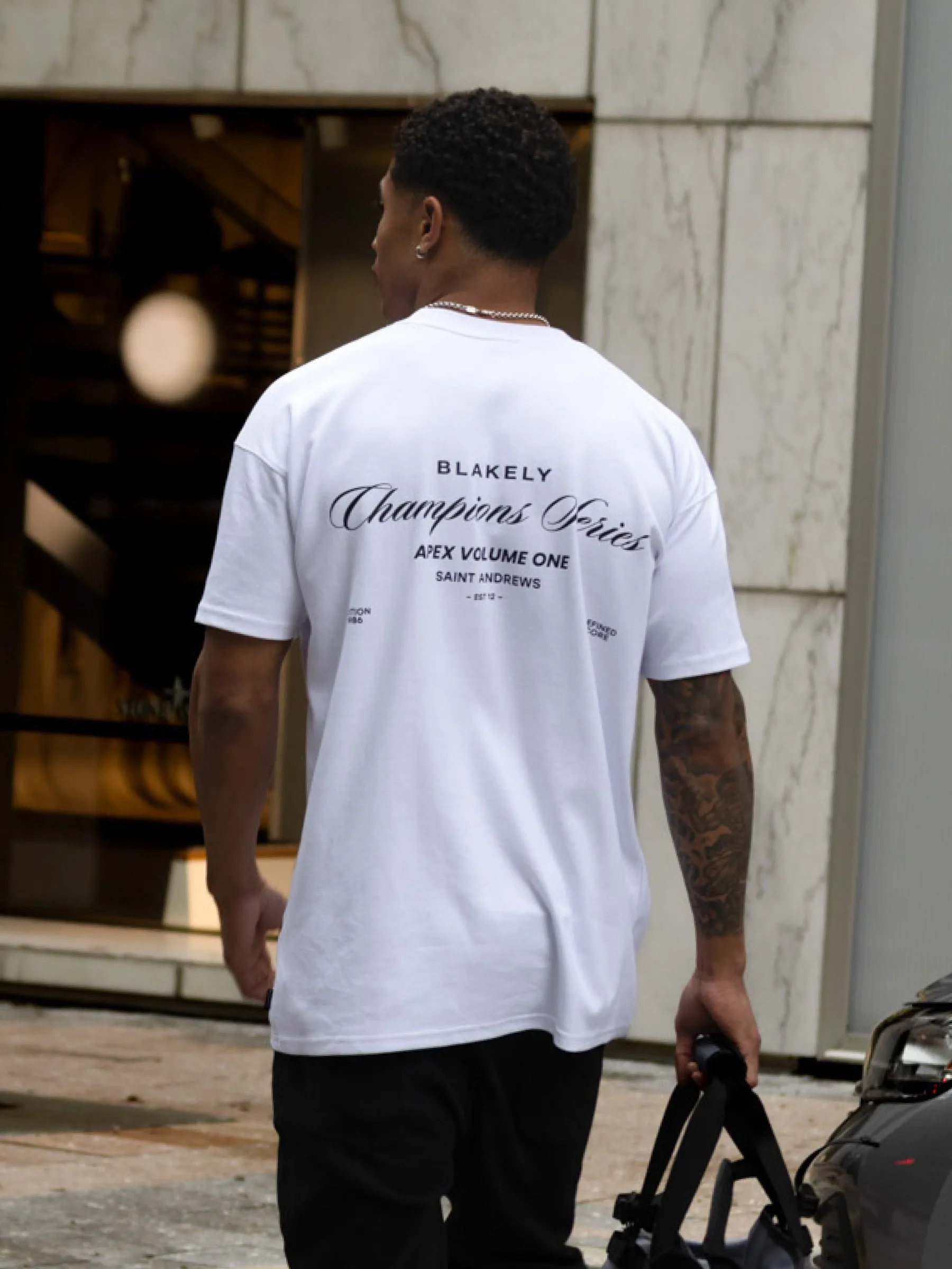 Champions Relaxed T-Shirt - White sold by Blakely