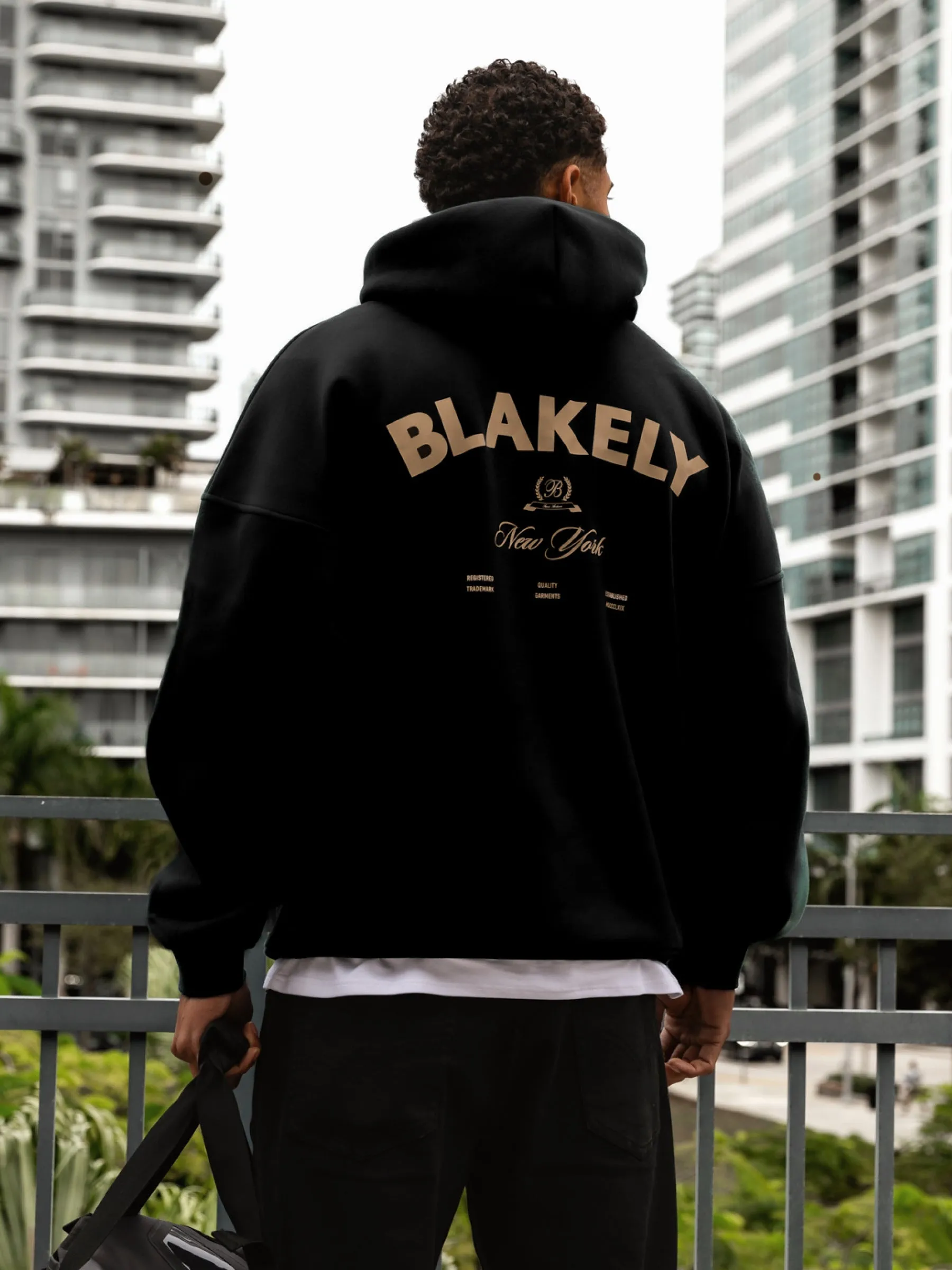 NY Crest Relaxed Hoodie - Black sold by Blakely