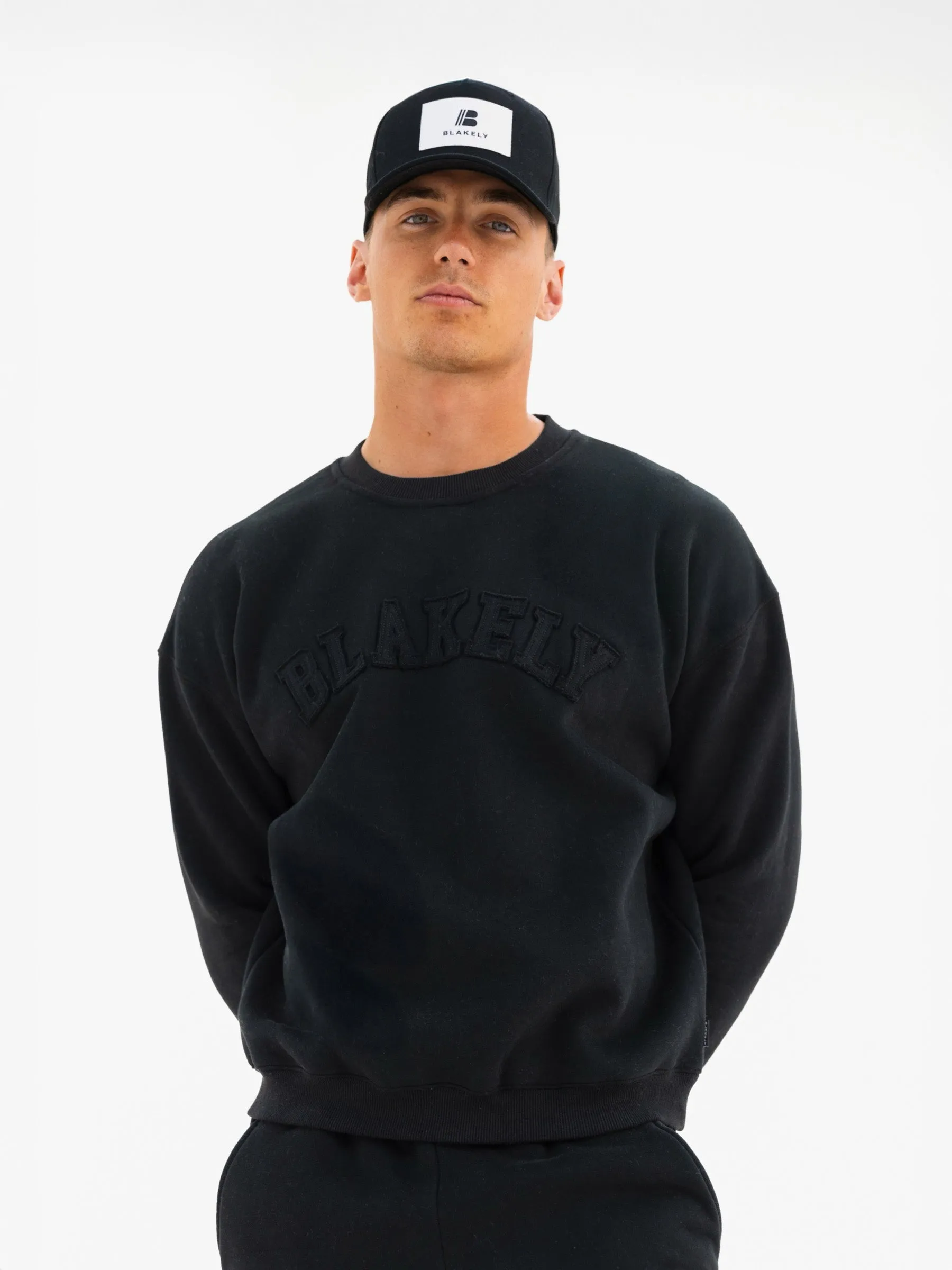 Tonal Varsity Relaxed Jumper - Black sold by Blakely