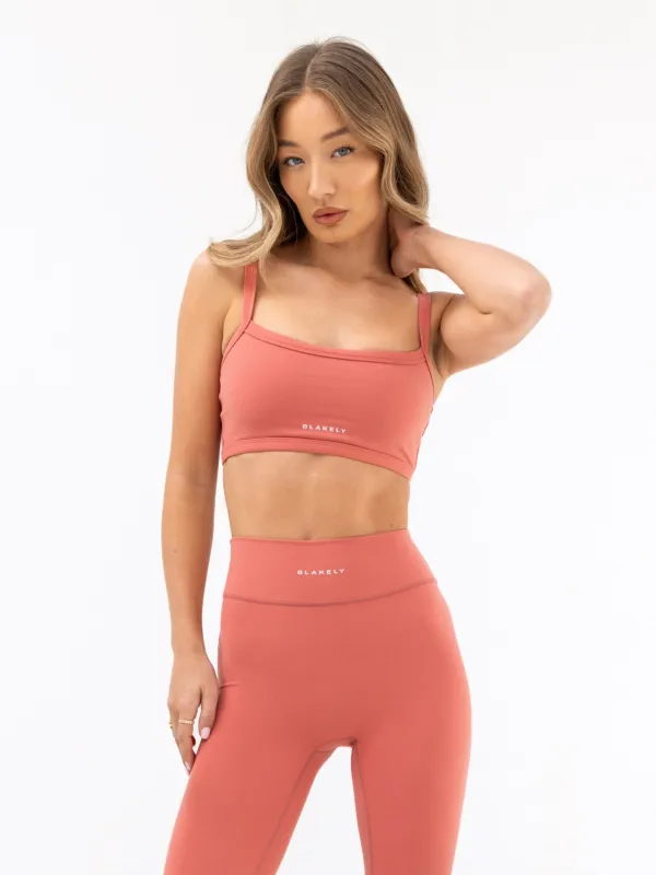 Ultimate Sports Bra - Sunrise Coral sold by Blakely