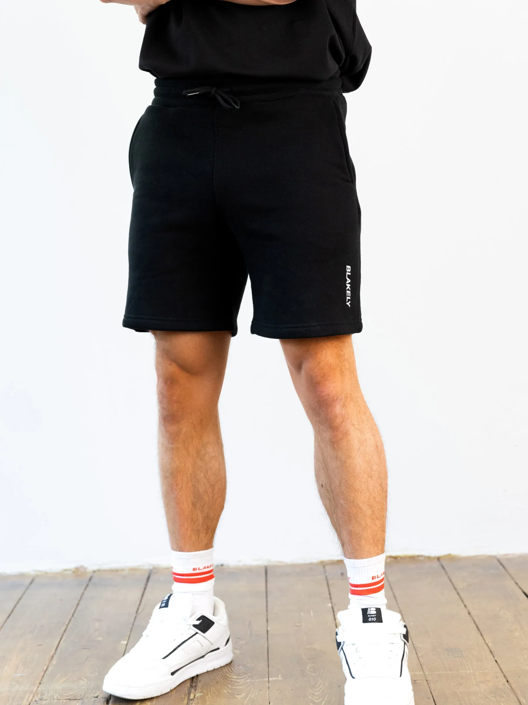 Italic Linear Relaxed Jogger Shorts - Black sold by Blakely