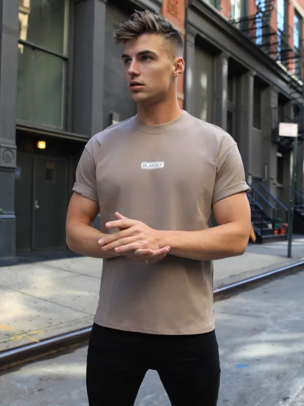 Universal Oversized T-Shirt - Brown sold by Blakely