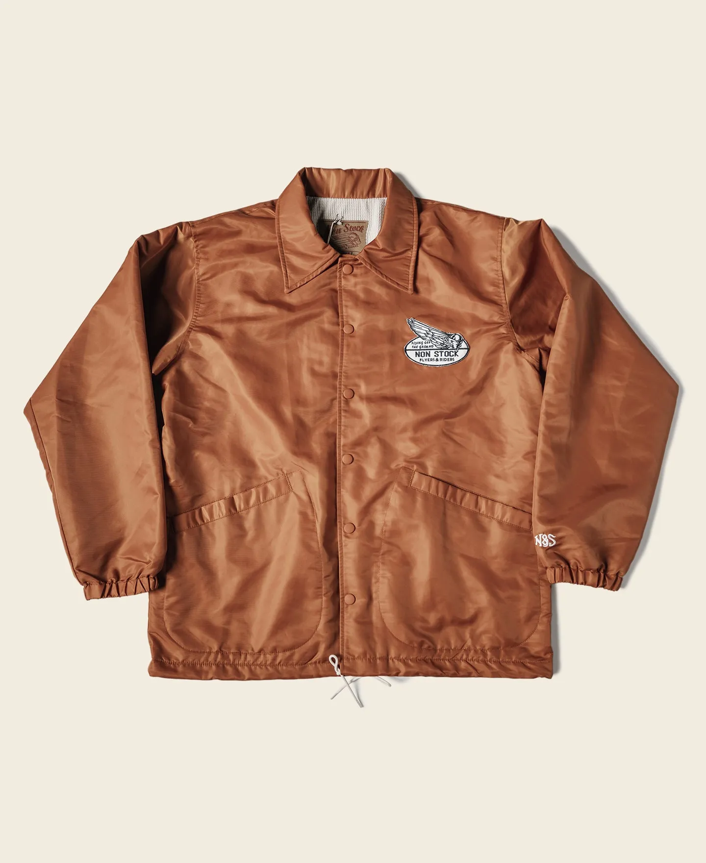Logo-Appliqued Nylon Coach Jacket - Orange sold by Bronson Mfg.