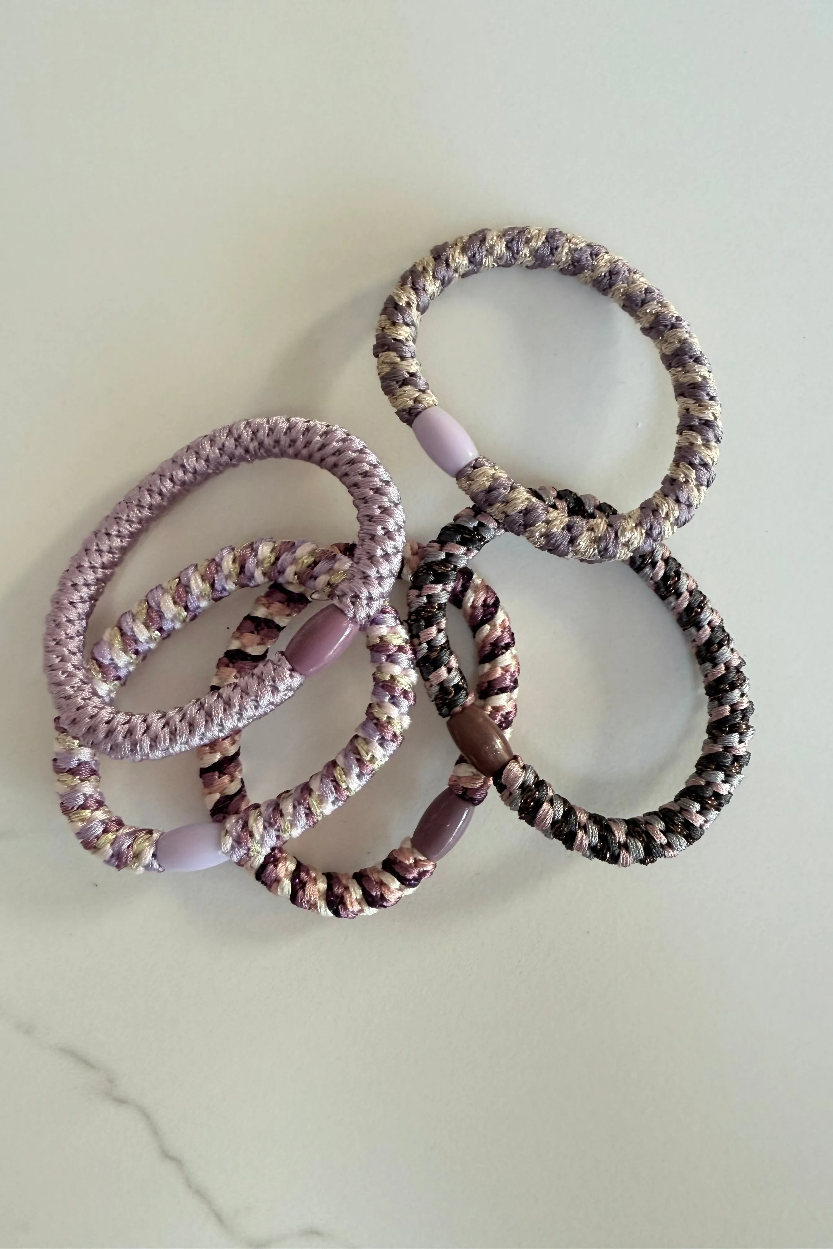 Puk Woven Hair Ties 10 Pack -Lilac sold by Ost London