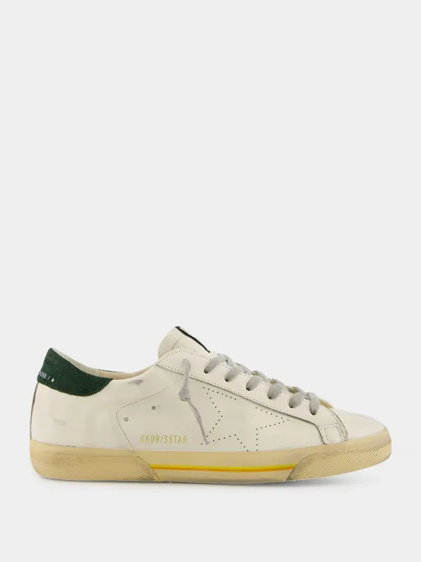 White Superstar Sneakers with Green Suede Heel sold by Fashion Clinic