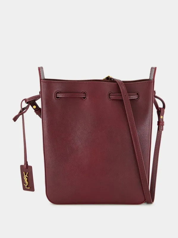 Hot Wine Leather Bucket Bag with Cassandre Charm sold by Fashion Clinic