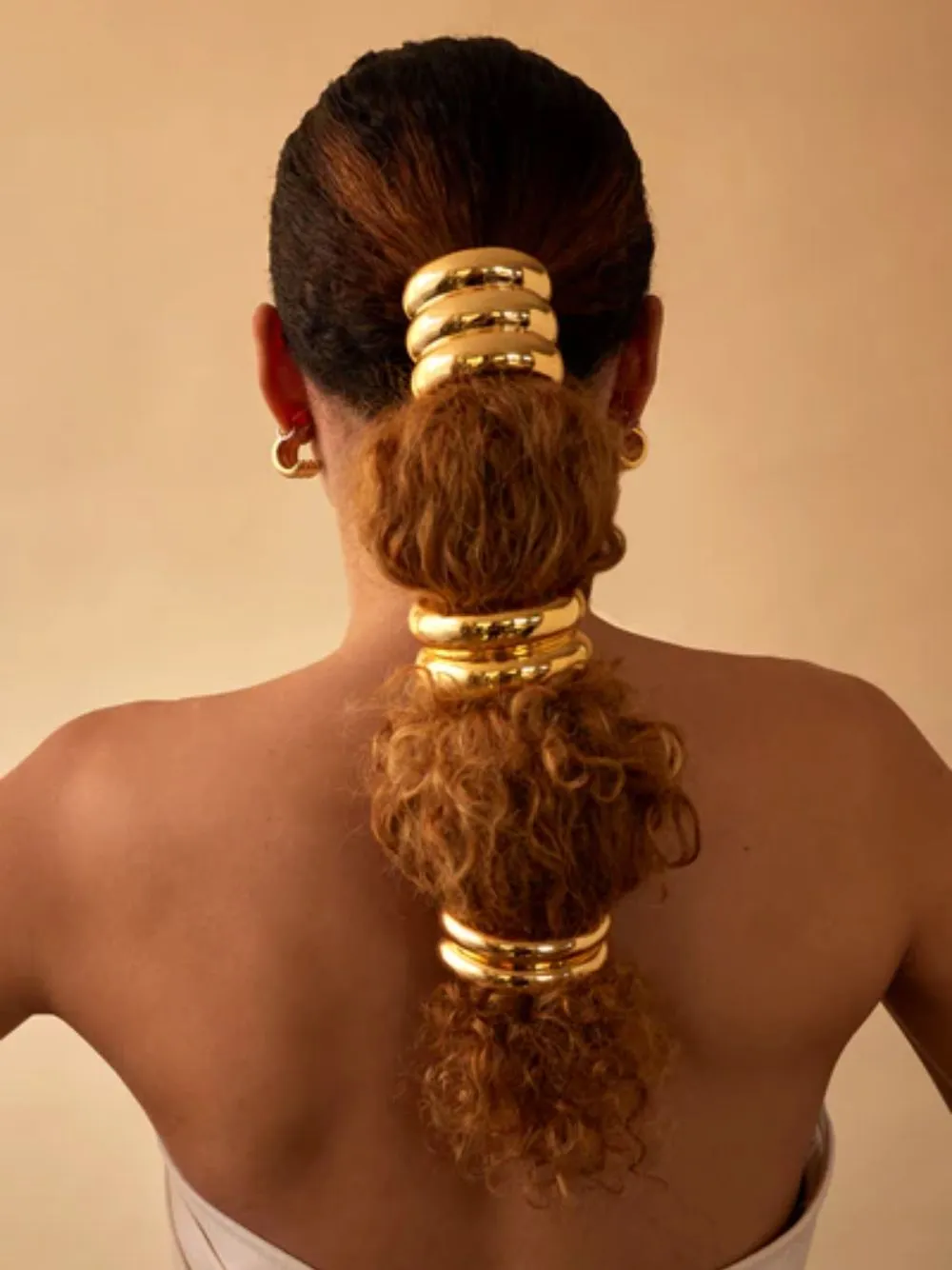 Gold Plated Glossy Double Arch Pony sold by Fashion Clinic