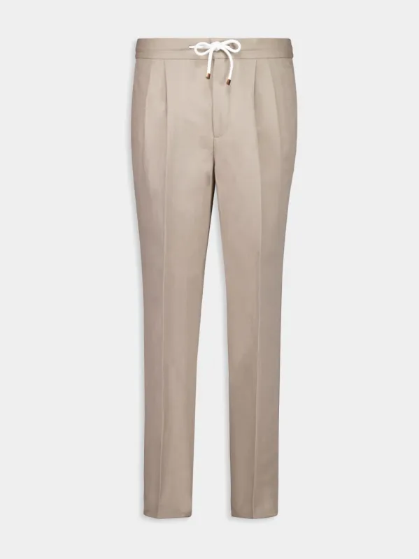 Beige Tapered-Leg Trousers sold by Fashion Clinic