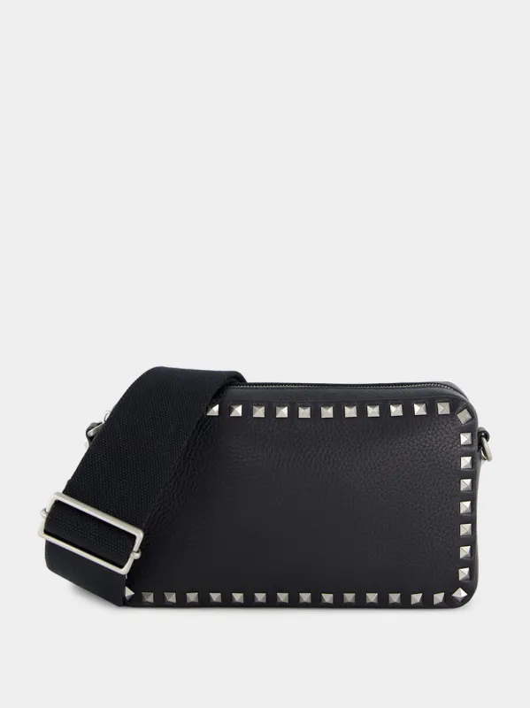Black Rockstud Grained Leather Crossbody Bag sold by Fashion Clinic